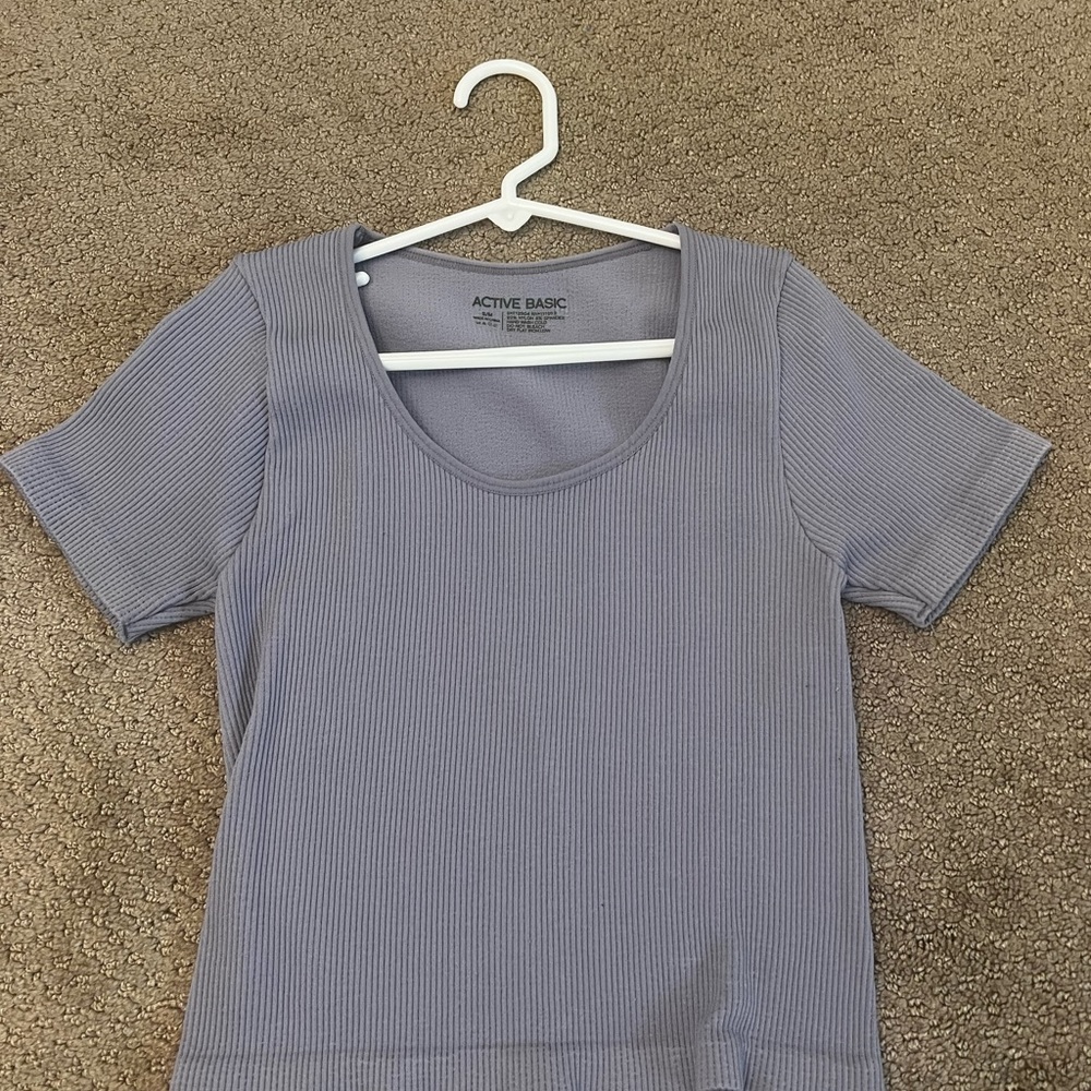 purple athletic shirt